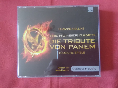Suzanne collins die tribute - -,